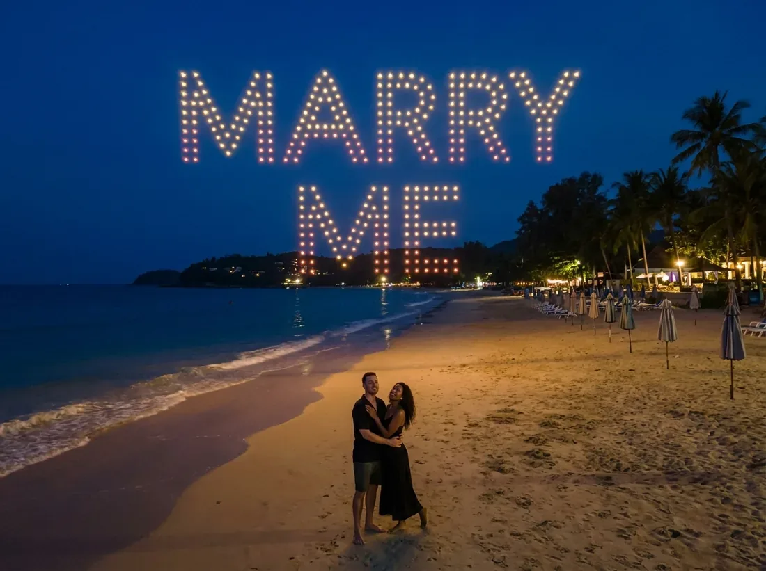 Aerial view of Kamala, Phuket, Thailand for a drone light show marry me night sky couple beach